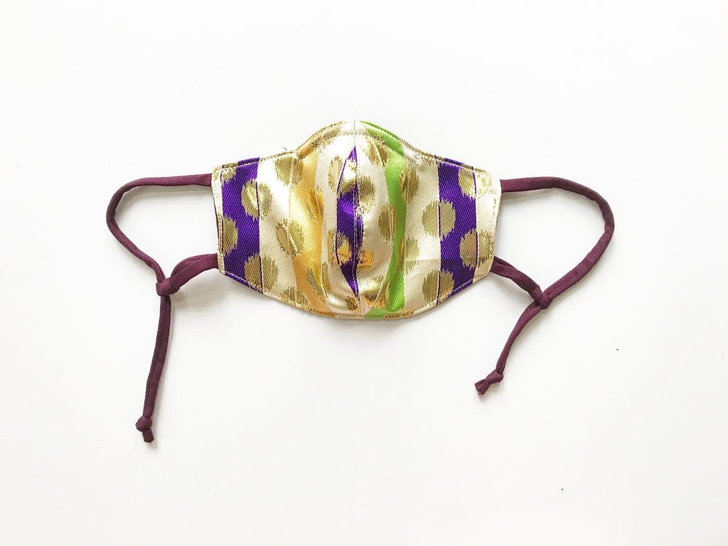Gold Spheres on Purple, Green, and Gold Stripes Face Mask with Straw Hole