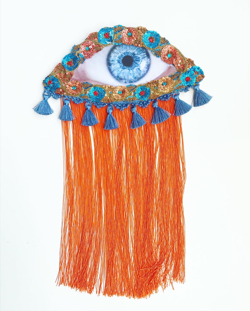 Eye Appliqué with Blue Tassels and Orange Fringe
